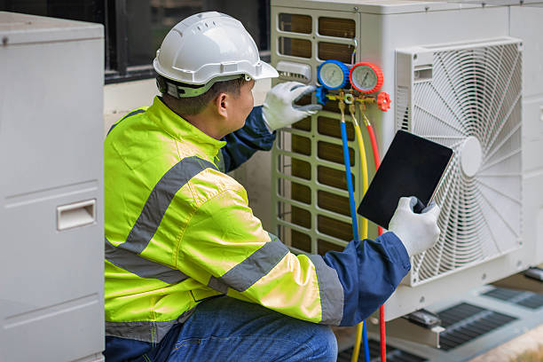Professional Heat Pump Repair technician working in Stoughton, MA